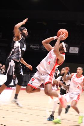 Potawatomi Fire small guard Jaylen Mahone jumps and aims during the April 11 home game with the Wichita Skykings. The Fire won, 132-113. Countywide &amp; Sun/Natasha Dunagan