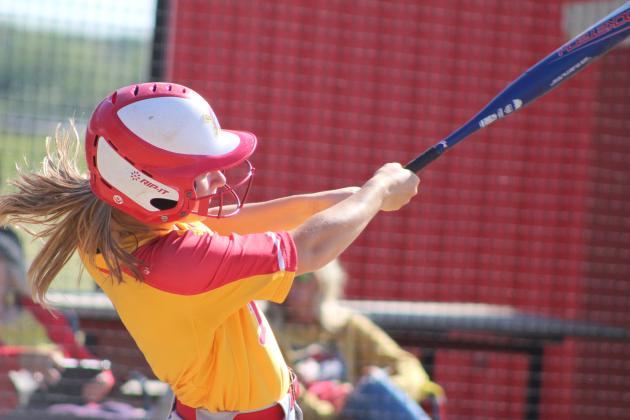 Dale's Heartly Snyder hits a single during the April 22 home game with Class 6A Mustang. In Class 4A, the Lady Pirates slow pitch team lost, 8-17, making their record 29-6. They were scheduled to play in regionals on April 23. Countywide &amp; Sun/Natasha Dunagan