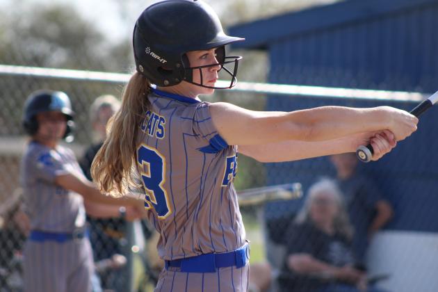 Bethel's Josie Megehee hits a single during the slow pitch double header with Davenport on April 8. The Lady Wildcats won both games, 12-0 and 10-0. Countywide &amp; Sun/Natasha Dunagan