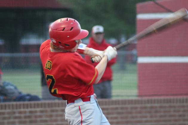 Easton Edmonson hits a single, which he turned into a double by immediately stealing second, during the April 8 home game with Tuttle. The Pirates won, 6-2. 