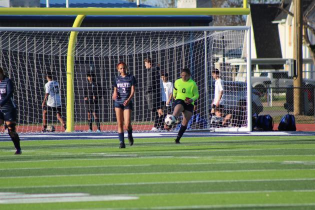 Shawnee's Breeauna Simpson (#3) watches as Goalie Allyson McAlister kicks the ball back into play during the home game against Victory Christian on April 2. The Lady Wolves lost, 0-6. Countywide &amp; Sun/Natasha Dunagan