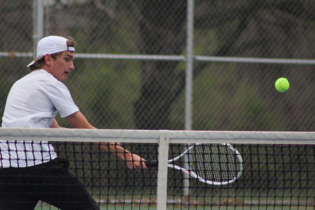 Tecumseh senior Jaxon Kuhn works on his backhand during the Tecumseh Tennis Tournament, April 2. Kuhn and his tennis partner Noah Henson competed in #1 Doubles. Tecumseh High School hosted eight schools for the two-day event. Countywide &amp; Sun/Natasha Dunagan