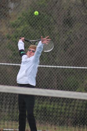 Tecumseh senior Jessy Thoma serves during the Tecumseh Tennis Tournament, April 2. Thoma and his tennis partner, Ted Belshe, competed in #2 Doubles. Tecumseh High School hosted eight schools for the event. Countywide &amp; Sun/Natasha Dunagan