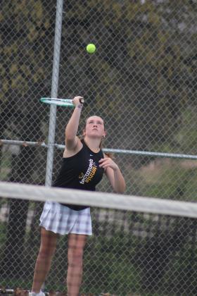 Tecumseh sophomore Kalyn Bartmess serves during the Tecumseh Tennis Tournament, April 1. Bartmess and her tennis partner, Lili Lowden, placed fourth in #2 Doubles. Tecumseh High School hosted eight schools for the two-day event. Countywide &amp; Sun/Natasha Dunagan