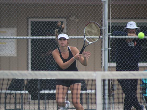 Tecumseh sophomore Kyann Sells sends the ball flying during the Tecumseh Tennis Tournament, April 1. Sells placed fourth in #1 Singles. Tecumseh High School hosted eight schools for the two-day event. Countywide &amp; Sun/Natasha Dunagan