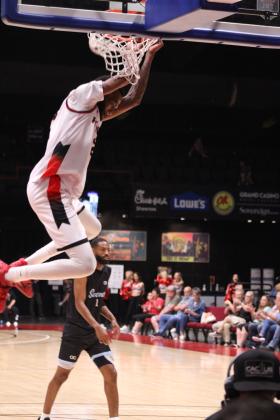 Potawatomi Fire Forward Jachai Simmons sinks a slam dunk in the third quarter of the May 11 home game against the Texas Seveners. Simmons made 17 points, 18 rebounds, three blocks and two steals in that game, according to www.potawatomifire.com. In their 17th-straight win for the season, the Fire beat the Seveners, 135-123. Countywide &amp; Sun/Natasha Dunagan