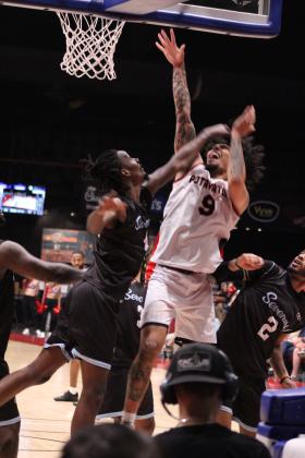 Potawatomi Fire Forward Isaiah Wade takes his shot and draws a foul.