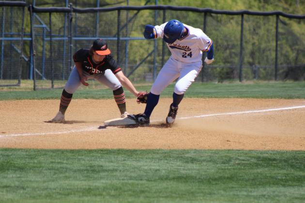 Bethel junior Cale Duncan tries to steal third base in the game with Morris during the Wildcat Woodbat Classic on April 12. The Wildcats won that game, 5-1, and also beat Newcastle, 5-4. Countywide &amp; Sun/Natasha Dunagan