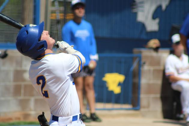 Bethel junior Bryce Tapley watches the ball after sending it flying in the game with Morris during the Wildcat Woodbat Classic on April 12. The Wildcats won that game, 5-1, and also beat Newcastle, 5-4. Countywide &amp; Sun/Natasha Dunagan