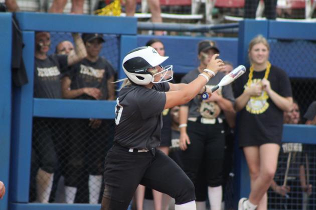 Freshman Embrie Smith hits a single.