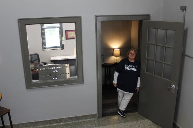Debra Watson's office with metal sign made by former JTA student.