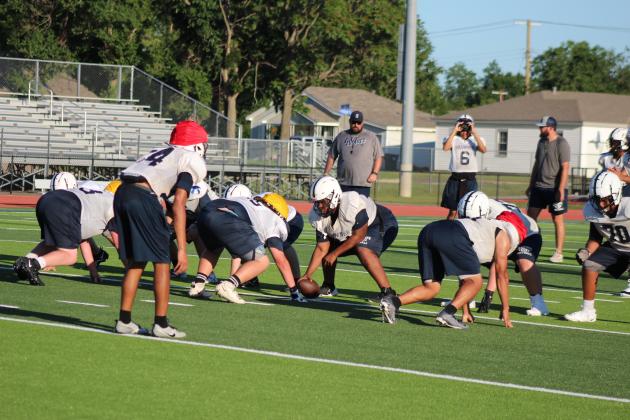 Football Wolves Play for First Time on Turf
