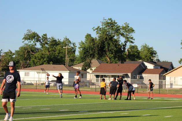 Community kids try out the turf.