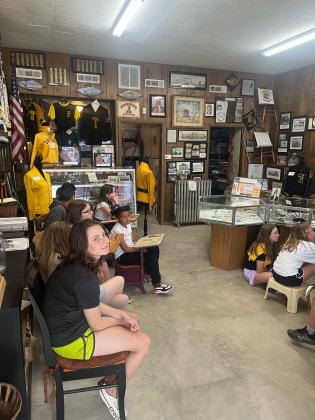 Fifth-graders from Cross Timbers Elementary learn about Tecumseh school history at the Tecumseh Historical Society Museum on May 2. About seven classes visited the museum at 114 S. Broadway in Tecumseh. Photo provided by Cody Swinson.