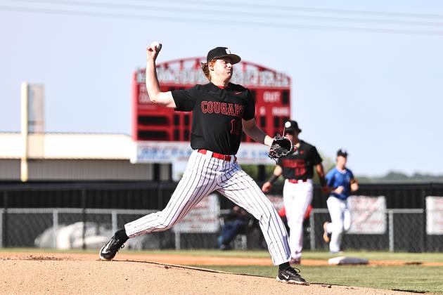 North Rock Creek's Colin Brown winds up for the pitch.