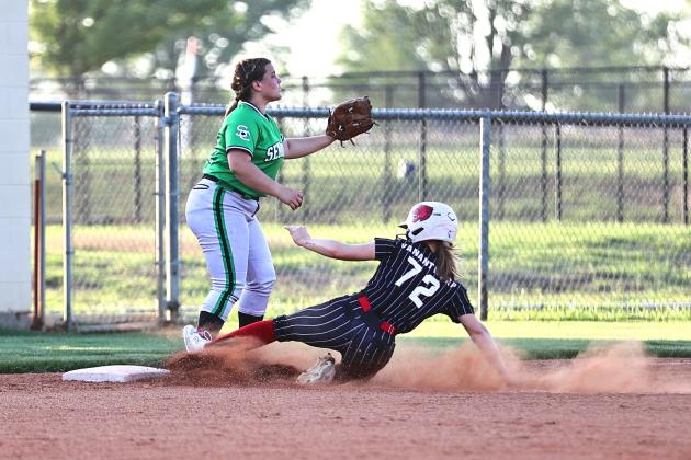 North Rock Creek's Olivia VanAntwerp slides safely into home during District games.