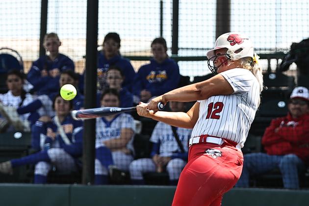 North Rock Creek's Hannah Earlywine connects with one of her two HR's.