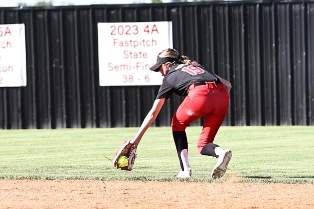 North Rock Creek's Sophie Morris makes the grab to throw the runner out at 1st.