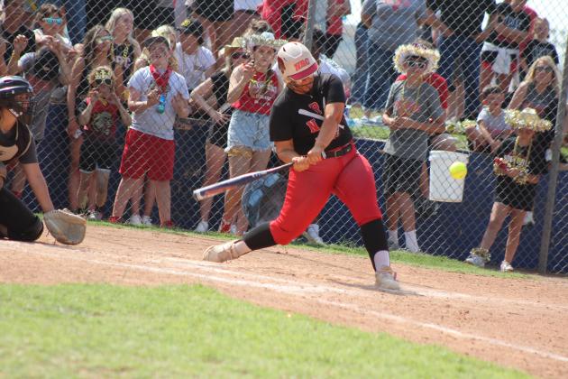 North Rock Creek's Hannah Earlywine prepares for a hit during the Class 5A Slow Pitch State Semifinals with Tecumseh on April 30. The #1-ranked Lady Cougars won in their Quarterfinals with Perkins-Tryon, 10-9, but lost to the #2-ranked Lady Savages in the Semifinals, 7-13. Their record this season is 33-9. Countywide &amp; Sun/Natasha Dunagan