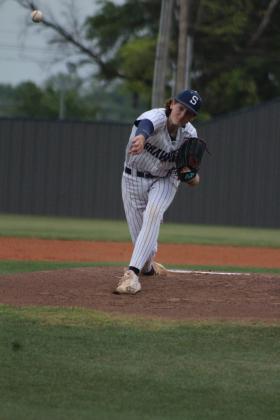 Shawnee senior TaSean Hishaw hurls one past the batter during the home game with Midwest City on April 25. The Wolves lost, 1-8. Countywide &amp; Sun/Natasha Dunagan