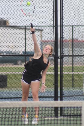 Tecumseh's Laycee Thoma serves, on the #1 Doubles team with Jalee Meyers, at the Shawnee NGB Tournament on April 26. Thoma and Meyers placed fifth, out of 16 schools that day. Countywide &amp; Sun/Natasha Dunagan