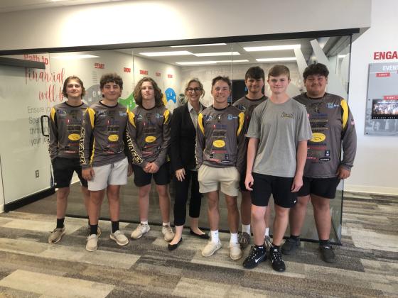 Members of the Tecumseh High School Fishing Teams pose with First United Bank Community President Jill Spencer. The Tecumseh bank is one of their sponsors. Members of the teams are, not in order, Carter Hadsall, Maddox Dickson, Daxton Stewart, Madden McKiddy, Wyatt Cosper, Brody Westcott, Bryscon Cosper and Coby Frank, not pictured. Two out of the three teams are preparing to compete on Lake Hartwell in South Carolina for the national championship, June 19-22. Photo provided by Janell Mitchell.