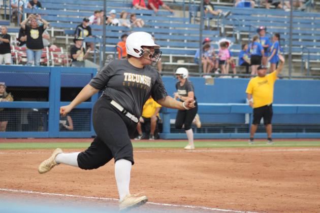 Tecumseh senior Khylei Daniels yells in excitement as she runs to first in the sixth inning of the Class 5A Slow Pitch State Championships against Washington on April 30. That day, the Lady Savages fought their way through Bristow, 14-10; #1-ranked North Rock Creek, 13-7; and Washington, 9-6, to become the first state champions in softball in school history. Countywide &amp; Sun/Natasha Dunagan