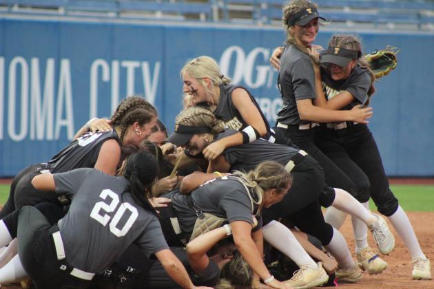The Tecumseh Lady Savages dogpile after winning the Class 5A State Slow Pitch Softball State Championship. All on April 30, they won the Quarterfinals with Bristow, 14-10; the Semifinals with North Rock Creek, 13-7; and the Finals with Washington, 9-6. Countywide &amp; Sun/Natasha Dunagan