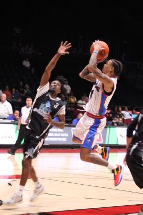 Potawatomi Fire Point Guard Chuck Guy aims a jump shot and sinks it in the fourth quarter of the second Central Conference Semifinal game, June 1 at FireLake Arena. Guy was once again the leading scorer with 33 points. The Fire continues their winning streak of 20 games in the regular season and both games in the Semifinals. They will play in the Finals, possibly beginning today (June 6). Watch for updates on their website and Facebook page. Countywide &amp; Sun/Natasha Dunagan