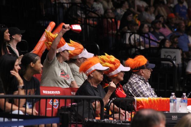 The "Fire Fanatics" show their support for the Potawatomi Fire basketball team, as they have at all of the games for all three seasons. Shown, back row, are Lisa Otipoby, Andrea Gabel, front row, Tia Azlin, Betty Gerhard and Eddie Gerhard. Jerry Azlin is not pictured. T. Azlin said they became friends after becoming fans, and now they meet monthly and talk about the team. She said they ordered the headgear online. Countywide &amp; Sun/Natasha Dunagan