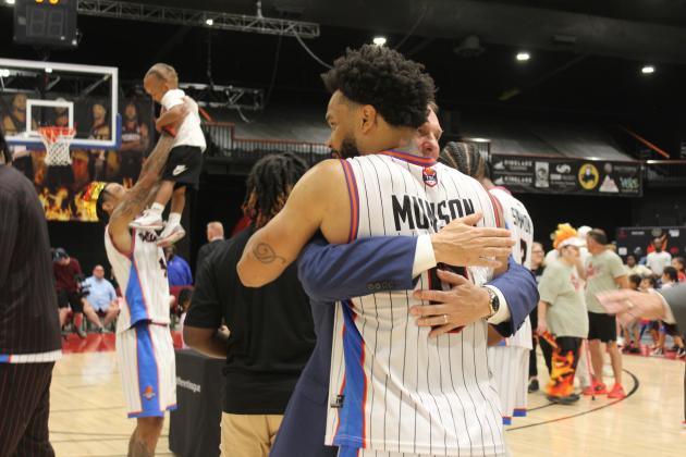 Deshawn Munson gets a hug from Potawatomi Fire Head Coach Mark Dannhoff after they won The Basketball League National Championship for the second year in a row and were undefeated the whole season. The Fire played a close game and beat the St. Louis Griffins, 119-108. Munson received the TBL Playoffs Most Valuable Player for the second time, as well. Countywide &amp; Sun/Natasha Dunagan