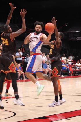 Potawatomi Fire Point Guard Deshawn Munson goes up for a basket and draws a foul during The Basketball League National Finals at FireLake Arena on June 23. They topped off their undefeated third season by beating the St. Louis Griffins, 119-108. Munson was chosen as the TBL Playoffs MVP for the second time. Countywide &amp; Sun/Natasha Dunagan