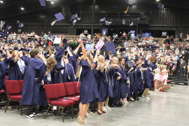 The Shawnee High School Class of 2024 tosses their caps following commencement, held at FireLake Arena on May 16. There were 186 graduates from Shawnee this year. Student Council President Marilyn Bartley and Senior Class President Kennedy Santos gave the Senior Class Address at the event. Countywide &amp; Sun/Natasha Dunagan