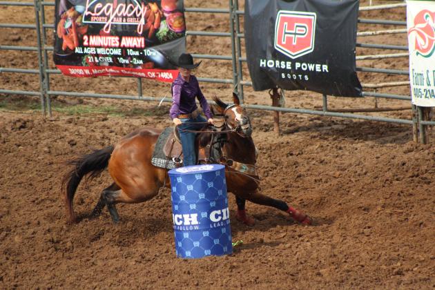 Kinzlee Jones, of Shawnee, participates in barrel racing.