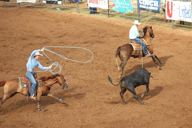 Landen and Hayden Youngblood, of Shawnee, compete in team roping.