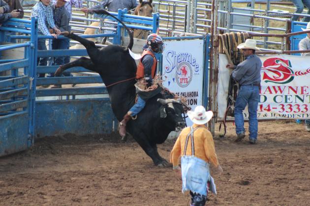 Hayden Averitt, of McLoud, begins his bull ride.