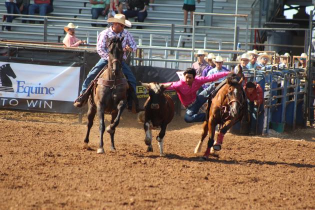 Blake Huddleston, of McLoud, prepares to wrestle a steer at the International Finals Youth Rodeo on the morning of July 10. Countywide &amp; Sun/Natasha Dunagan