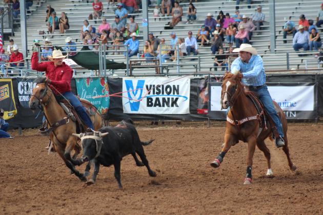 Bobby Vaughan, of Lexington, OK, and Brayden Kunz, of Milan, KS, work together to rope a steer, July 11, at the International Finals Youth Rodeo, held at the Heart of Oklahoma Expo Center. The IFYR attracted more than 1,100 entries from 32 states and provinces, plus some from Australia and New Zealand. Countywide &amp; Sun/Natasha Dunagan