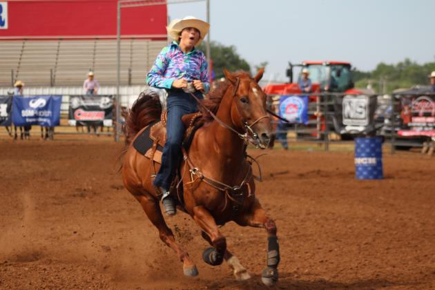 Patton Ann Lynch, of Crawford, TX, reacts to her barrel racing time of 15.913 on the morning of July 11 at the International Finals Youth Rodeo. Lynch went on to become the champion of the event this year. Countywide &amp; Sun/Natasha Dunagan