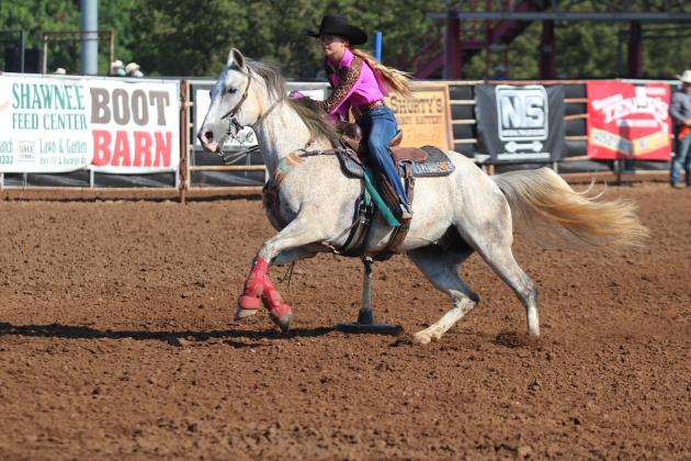 Kinzlee Jones, of Shawnee, competes in the pole bending at the International Finals Youth Rodeo on the morning of July 12. Countywide &amp; Sun/Natasha Dunagan