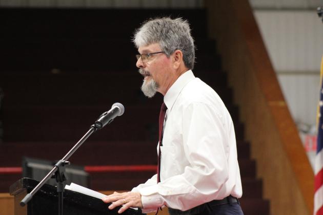 Retired Macomb Science Teacher Wayne Howard speaks at Macomb's graduation on May 4. Howard taught for 23 years and said he "worked several jobs to find out what I didn't want to do." He advised the graduates to not let fear stop them from doing something. His fellow commencement speaker was History Teacher Nathan Floyd who also said the graduates should not fear making mistakes. Countywide &amp; Sun/Natasha Dunagan