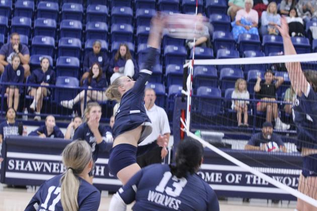 Shawnee's Josie Megehee makes a block at the home match with El Reno on Aug. 22. The Lady Wolves won, 3-0 (25-18, 25-12, 25-19). Countywide &amp; Sun/Natasha Dunagan