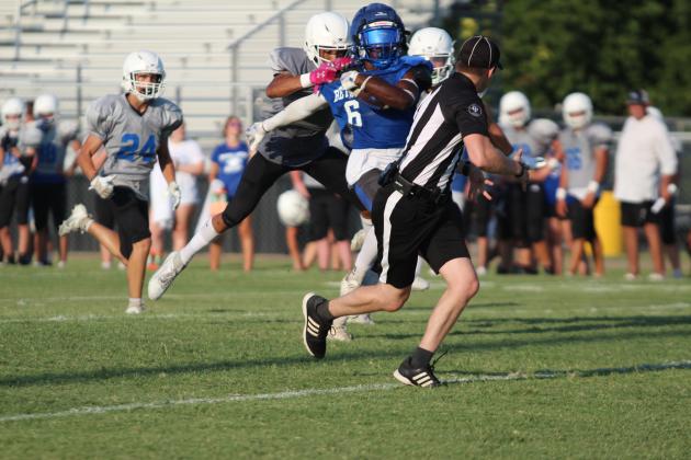 Bethel junior Ezra Powis runs the ball in the scrimmage with Bridge Creek on Aug. 23. The four-team scrimmage was held at Tecumseh High School, and included all the teams mentioned plus North Rock Creek. The Bethel Wildcats will play their first game at home on Sept. 6 at 7 pm against Luther. Countywide &amp; Sun/Natasha Dunagan