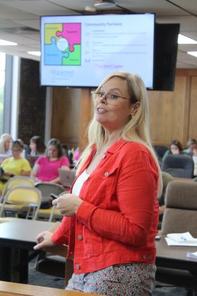 Crystal Romanyszyn, with Shawnee Forward, speaks to the Shawnee Board of Education about the "Pathways to Professions" 12-week comprehensive program during the Aug. 5 regular meeting. Countywide &amp; Sun/Natasha Dunagan