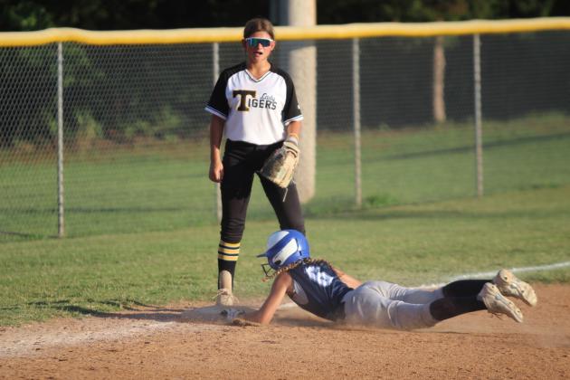 Asher sophomore Gracie Swinney steals third base in the second inning of the Aug. 19 home game against Tupelo. The Asher Lady Indians won, 3-1. Countywide &amp; Sun/Natasha Dunagan