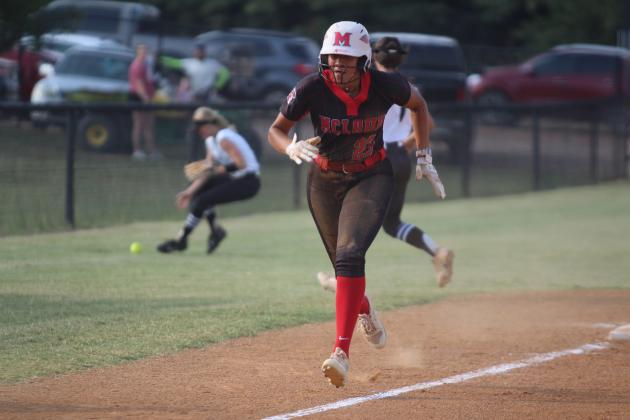 As a Perkins-Tryon player recovers the ball, McLoud's Taycee Lewis steals both third and home, after hitting a double during the fourth inning of the home game on Aug. 26. The Lady Redskins won, 13-6. Countywide &amp; Sun/Natasha Dunagan