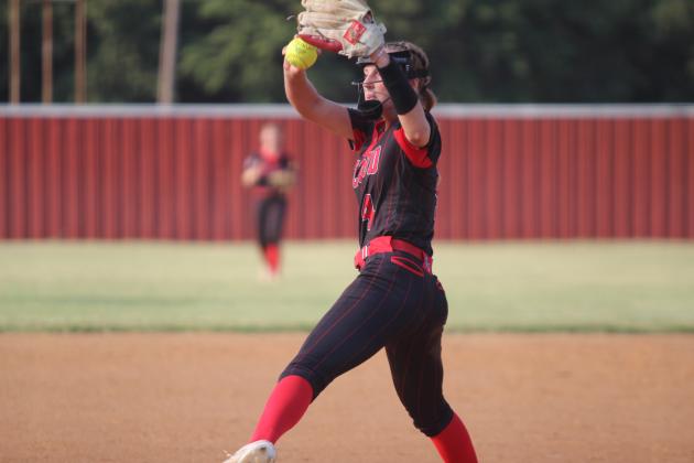 McLoud's Ella Smith winds up her pitch during the fourth inning of the home game with Perkins-Tryon on Aug. 26. The Lady Redskins won, 13-6. Countywide &amp; Sun/Natasha Dunagan