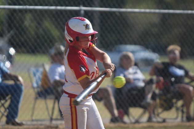 Dale senior Kinsley Hill makes contact with the ball in the fourth inning of the fast-pitch game at Bethel on Aug. 29. The Pirates won, 5-1. Countywide &amp; Sun/Natasha Dunagan