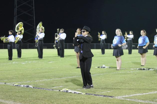 Bethel Drum Major Stohri Rhynalds gives the signal that the Pride of Bethel marching band is ready to perform at halftime of the first football game, Sept. 6. Their theme this year is music from the Blues Brothers. Countywide &amp; Sun/Natasha Dunagan