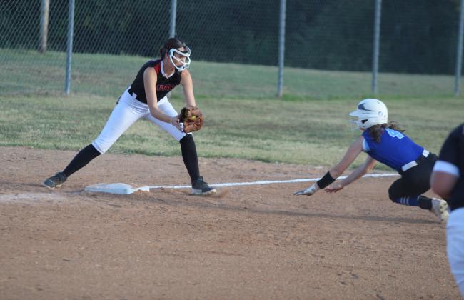 Earlsboro senior Natalie Peters prepares to tag out a Depew player who is diving into third base during the home game on Sept. 17. The Lady Wildcats lost, 3-9. Countywide &amp; Sun/Natasha Dunagan
